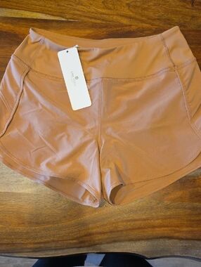 CRZ YOGA Women's Athletic High-Rise Shorts — Rust Tan